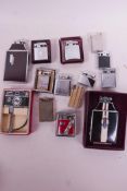 A selection of lighters including a mint in box Camera Lite, two Ronson Mastercases, a Beattie Jet