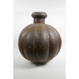 An Indian metal gourd shaped water pot, 17½" high