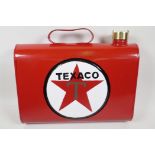 A replica vehicle mounted spare fuel can, marked Texaco, 13½" wide
