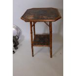 A Victorian bamboo occasional table with hexagonal top and square undertier with tooled fabric tops,