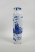 A Chinese blue and white porcelain cylinder vase decorated with figures in a mountain landscape,