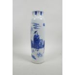 A Chinese blue and white porcelain cylinder vase decorated with figures in a mountain landscape,