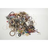 A large quantity of costume jewellery including bangles, necklaces, earrings etc