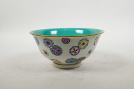 A Chinese polychrome porcelain rice bowl with floral decoration, seal mark to base, 6" diameter