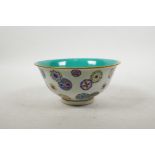 A Chinese polychrome porcelain rice bowl with floral decoration, seal mark to base, 6" diameter