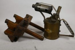 A vintage brass and wood rebate plane, together with a brass blow lamp with iron handle, 8" high