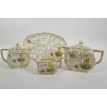 An Art Deco Empire Ware porcelain Garden Pattern teapot, water jug, milk jug and serving plate (teap