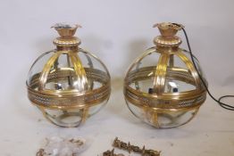 A pair of contemporary brass ball pendant lanterns, 18" diameter, 23" high