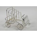 A silver plated toast rack in the form of a vintage car, 6½" long