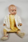 A rare C19th large Armand Marseille of Germany porcelain bisque head doll, used as an advertising do