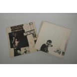 A Beatles - The Beatles vinyl sleeve insert poster/lyric sheet, and a John Lennon imagine vinyl slee