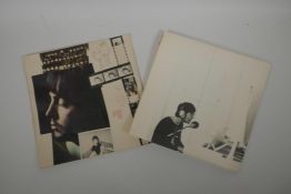 A Beatles - The Beatles vinyl sleeve insert poster/lyric sheet, and a John Lennon imagine vinyl slee