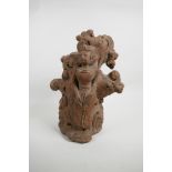 A Javanese terracotta figural ornament, 12½" high