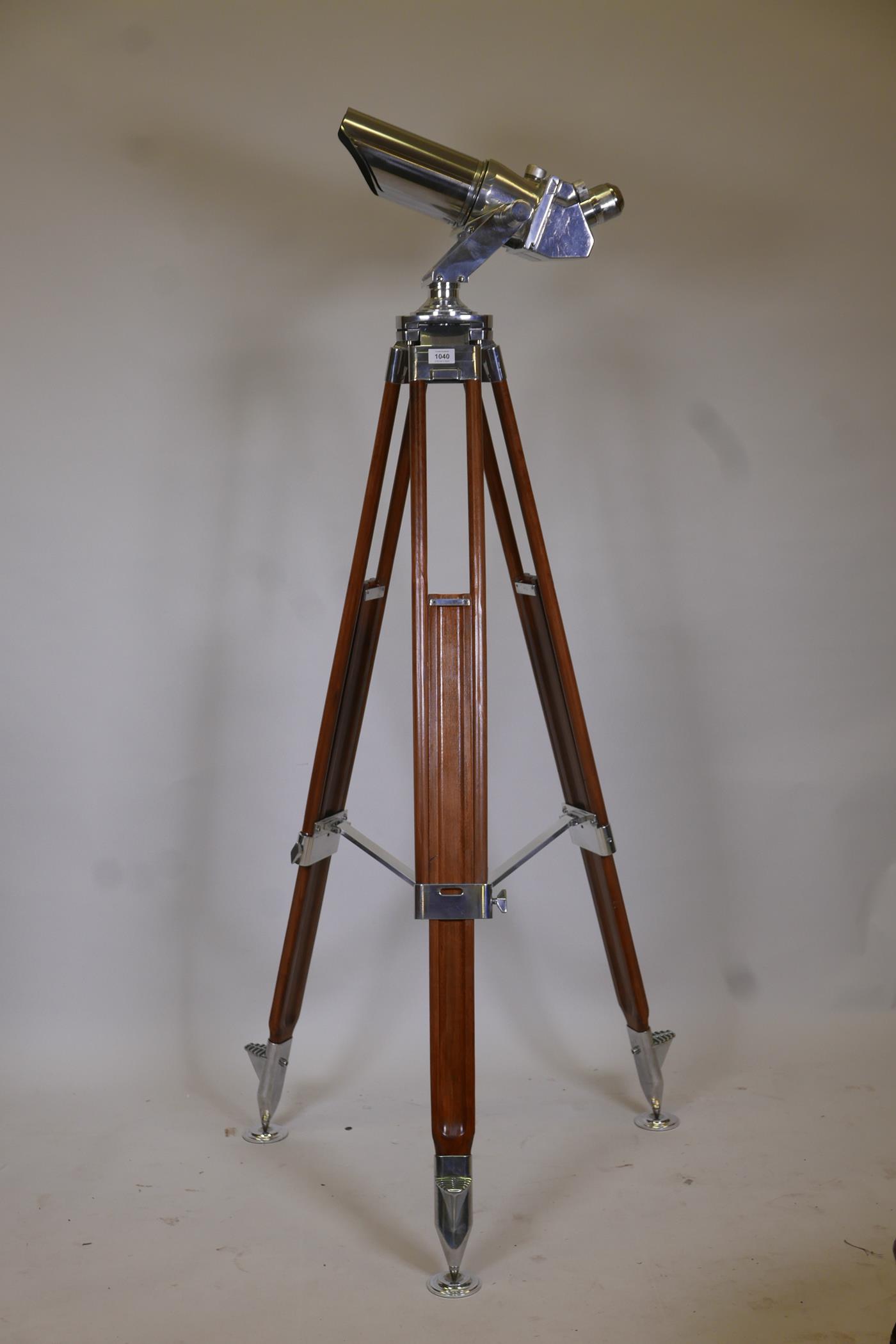 A pair of German ex-military 10x80 anti aircraft (flak) binoculars on a later adjustable wood and ch