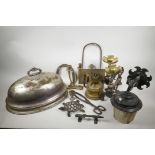 A collection of assorted metal wares including Art Nouveau iron and brass fire dogs, trivets, silver