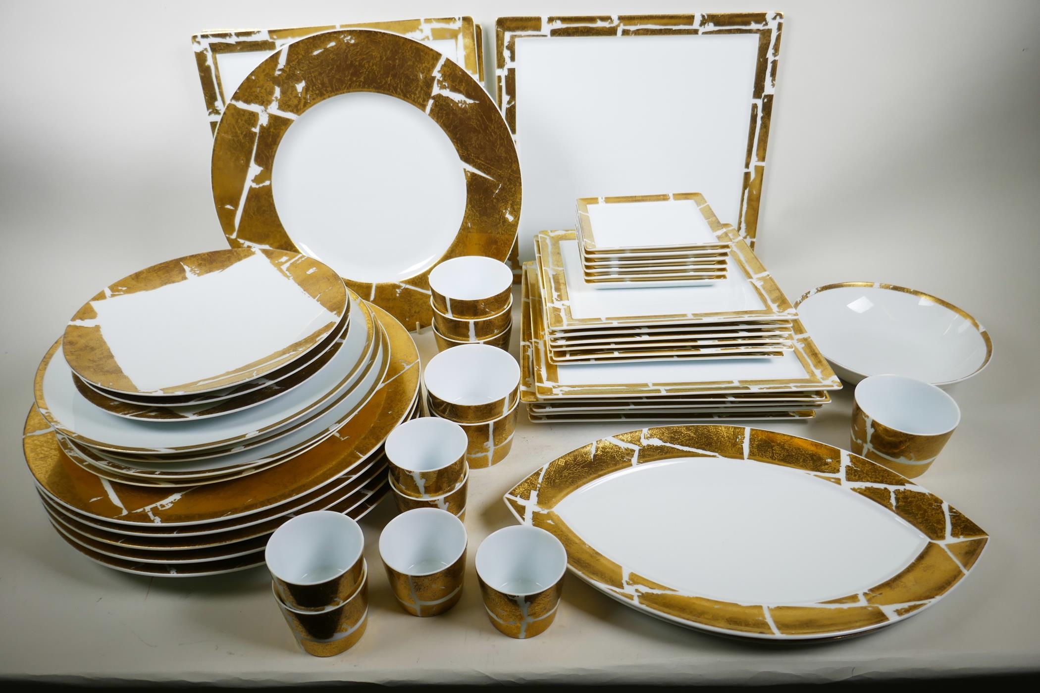 A superb, as new, Bernardaud Limoges 'Feuille d'Or' fifty piece contemporary porcelain dinner servic