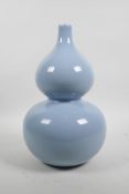 A Chinese porcelain double gourd vase with a blue Ru ware style glaze, seal mark to base, 12" high