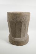 An Indonesian carved wood mortar, 15" high x 12" diameter