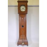 A C19th French oak longcase clock with 30hr movement and glazed dial with painted Roman numerals, 92