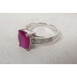A ruby set silver dress ring, size 'S'