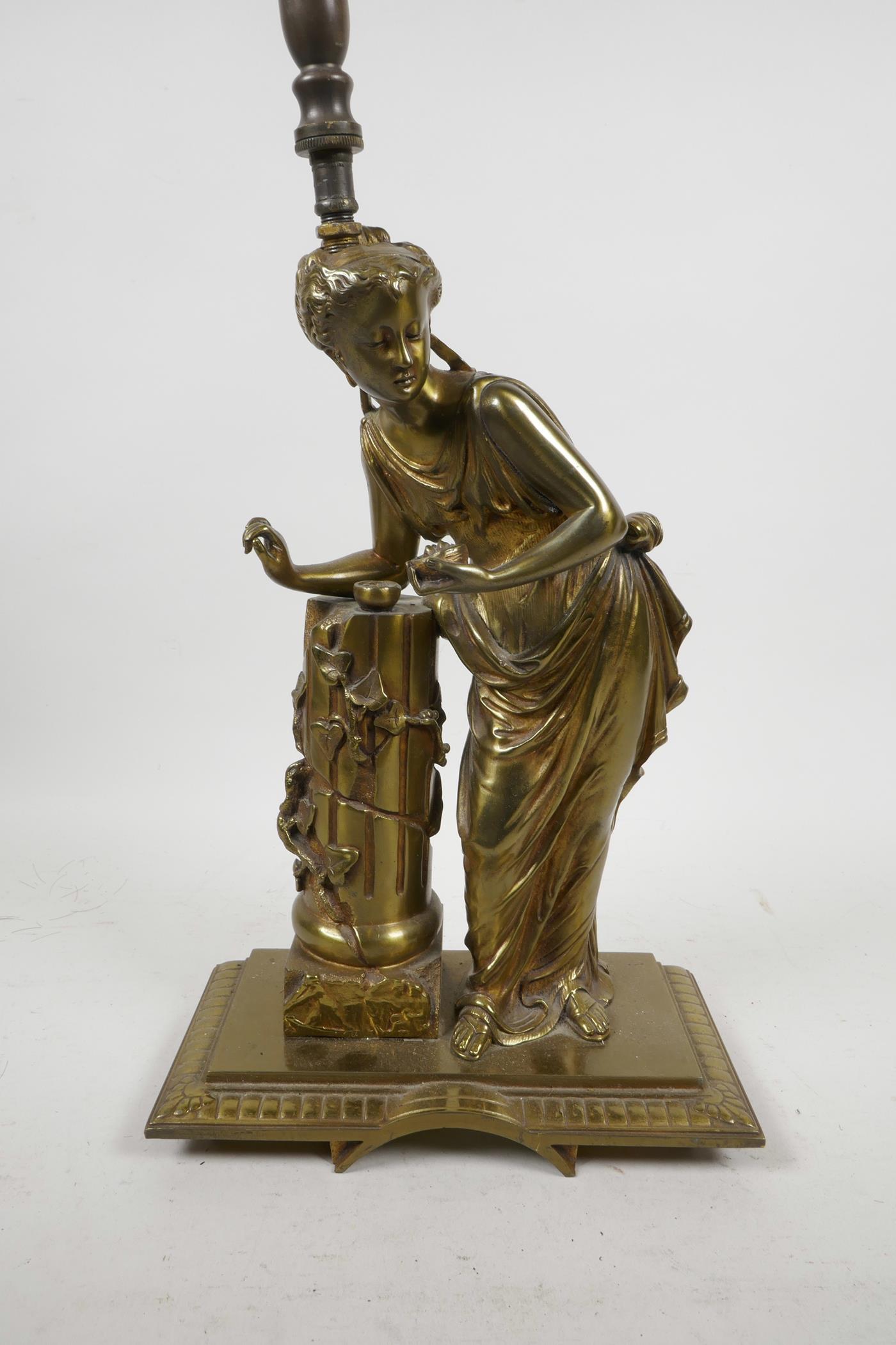 A brass table lamp in the form of a classical woman, 20" high - Image 2 of 2