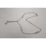 A silver Albert style necklace with riding stirrup decoration, 19" long plus tassles