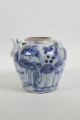 A Chinese blue and white porcelain pourer/pot with four lug handles and decorated with a stylised la