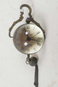 A small glass and brass ball pendant watch with ball drop and tassel, 1" diameter