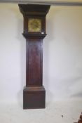 An C18th oak long case clock, the brass dial with engraved decoration of a sailing ship off a harbou