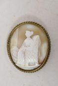 A C19th cameo brooch in a wire twist frame, 2" long