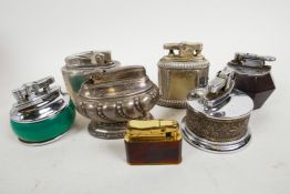 A collection of table lighters including a Ronson in silver base, A Polo, a Monopol, Ronson Crown an