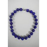 A lapis lazuli bead necklace, 20" long