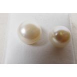 A pair of cultured pearl and silver stud earrings