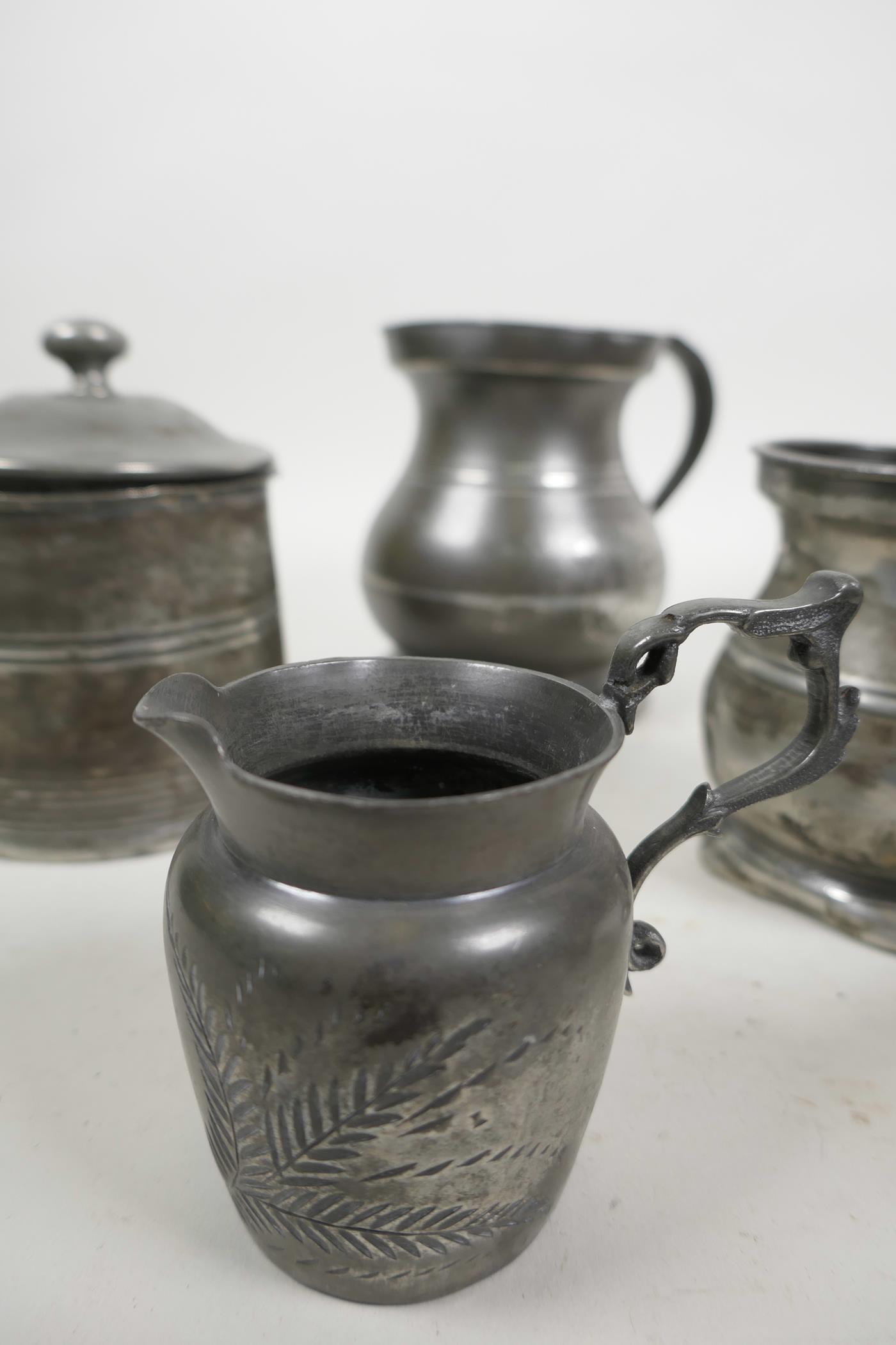 A collection of C18th pewter vessels including a large lidded tankard, English c.1780, with double d - Image 4 of 5