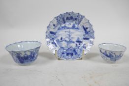 Two Chinese Yongzheng (1723-1735) blue and white fluted tea bowls with a matching saucer, saucer 4"