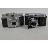 A vintage Voightlander Vito II 35mm camera together with a vintage Agfa 35mm camera