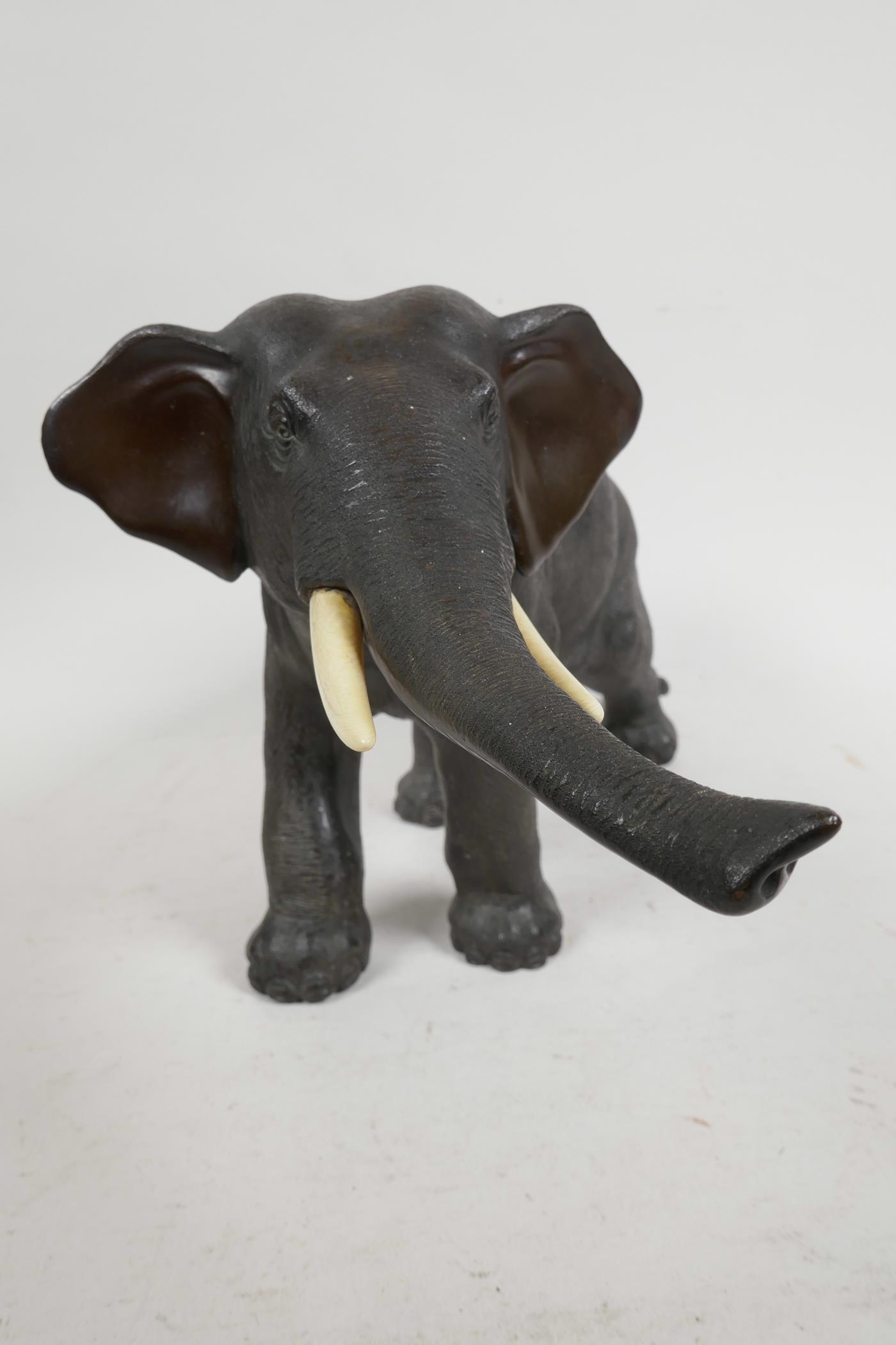 A Japanese Meiji period bronze figure of an elephant, signed Seiya Saku, 7" high, 13" long - Image 2 of 6