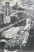 Lino cut of a canal scene with turreted bridge, titled verso 'Rochdale Canal, Knott Mill, Manchester