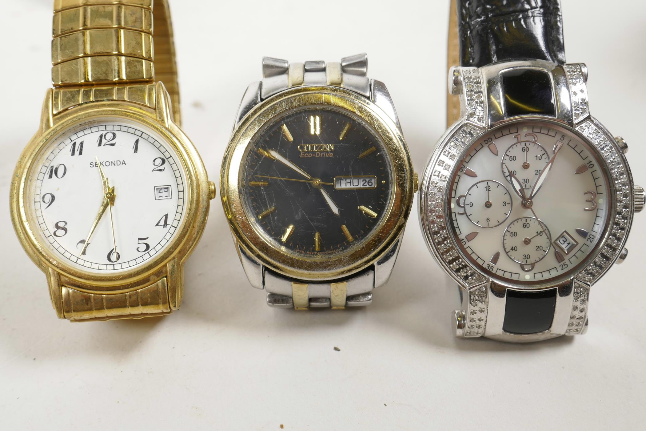 Two lady's watches with white linked straps, and another in a similar style with a leather strap and - Image 3 of 4