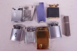 A Dunhill Unique A size pocket lighter, along with eight others including a silver Colibri Tube, Pol