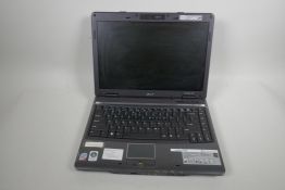 An Acer Travelmate 4720 laptop computer with bag and charger