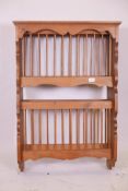 A pine hanging plate shelf rack, 26" x 11", 39" high