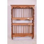 A pine hanging plate shelf rack, 26" x 11", 39" high