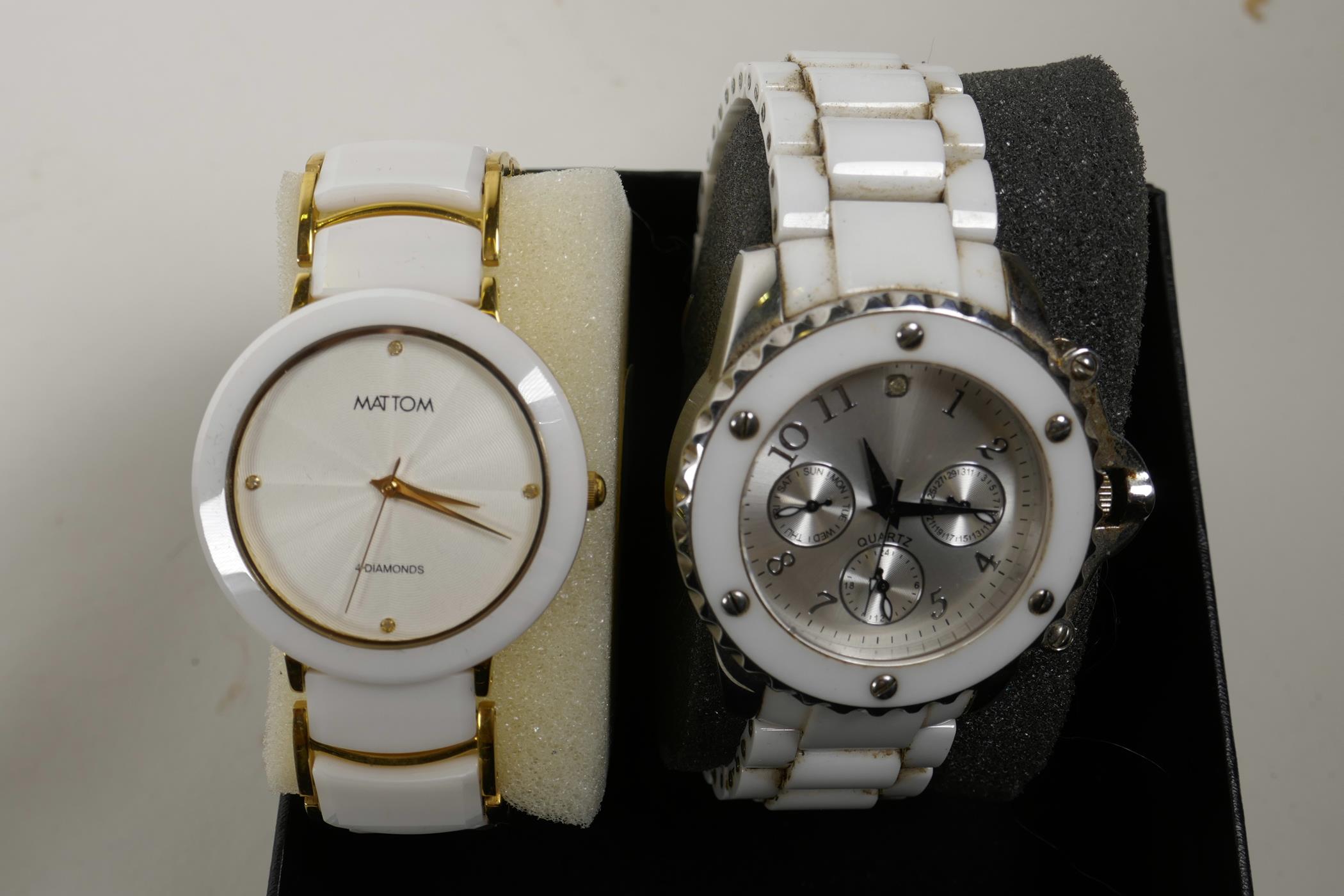 Two lady's watches with white linked straps, and another in a similar style with a leather strap and - Image 4 of 4