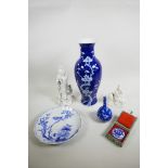 A mixed lot of Chinese decorative pieces consisting of a blue and white prunus baluster vase, 5½" wi