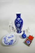 A mixed lot of Chinese decorative pieces consisting of a blue and white prunus baluster vase, 5½" wi