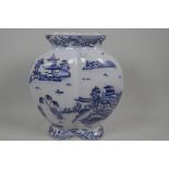 A Chinese blue and white double gourd vase decorated with a variation on the Willow Pattern, marks t