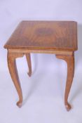 An Oriental brass inlaid occasional table on cabriole legs, 22" high x 18" square