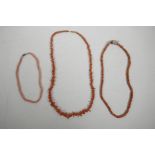 Three coral necklaces of assorted shaped beads, longest 24"