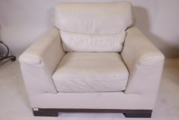 A Natuzzi leather easy chair